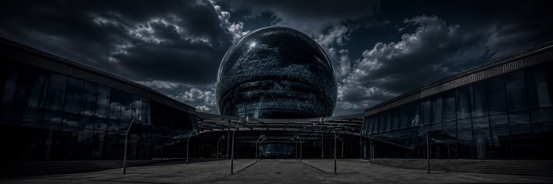 A night view of the Nur Alem sphere and the EXPO pavilions in Astana